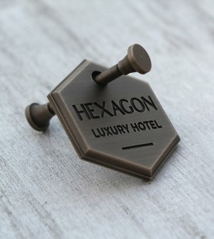 Llaveros numerados para hoteles en forma hexagonal